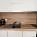 Mili *