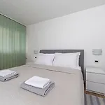 Mili *