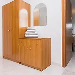 Mili *